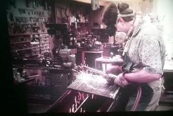 Cutting steel with a torch during fabrication