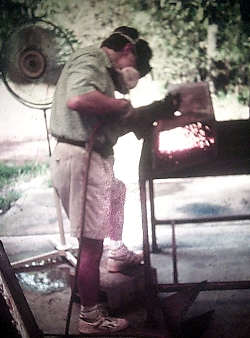 Tim Puckett welding the fork mount for the 60cm telescope in his home workshop